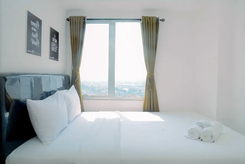 2BR Fully Furnished Minimalist Bassura City Apartment By Travelio - Image 1
