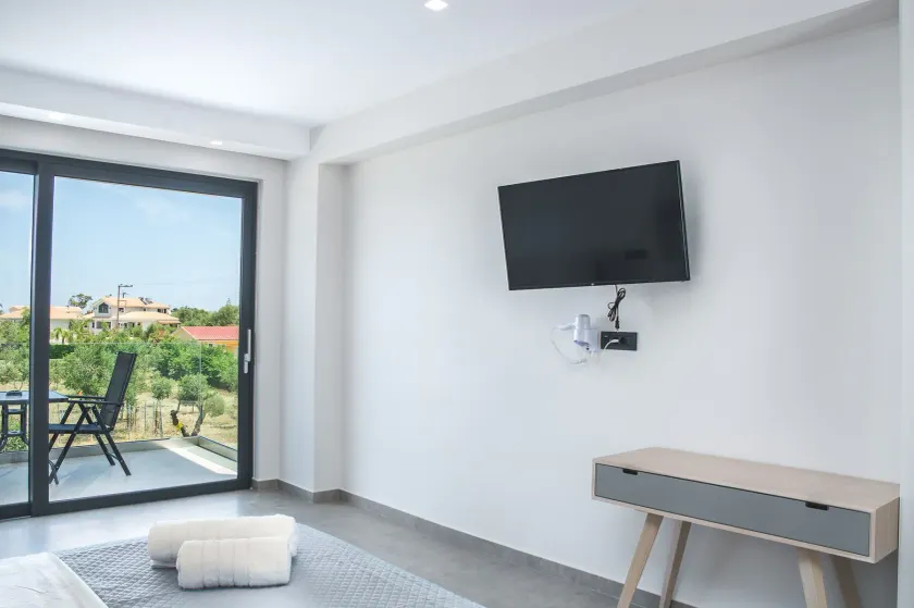 Dionisos Luxury Suites - Chambre