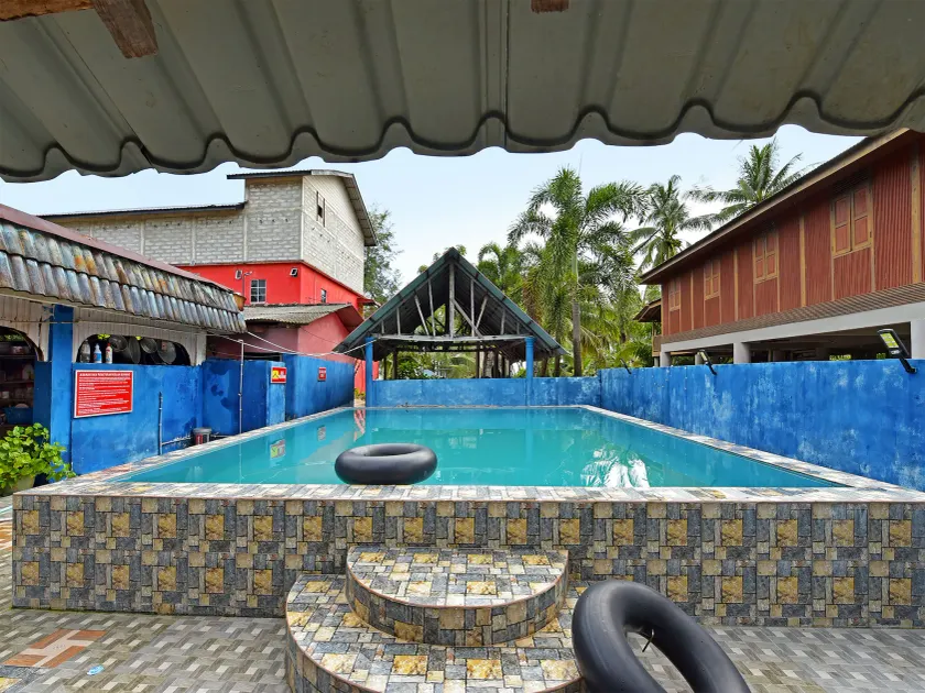 Capital O 90664 Rabi Hotel - Image 1