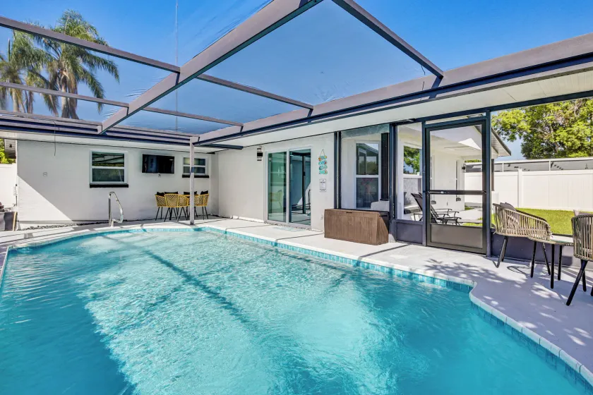 Canal Front Getaway Poolside Relaxation Fishing - Image 1