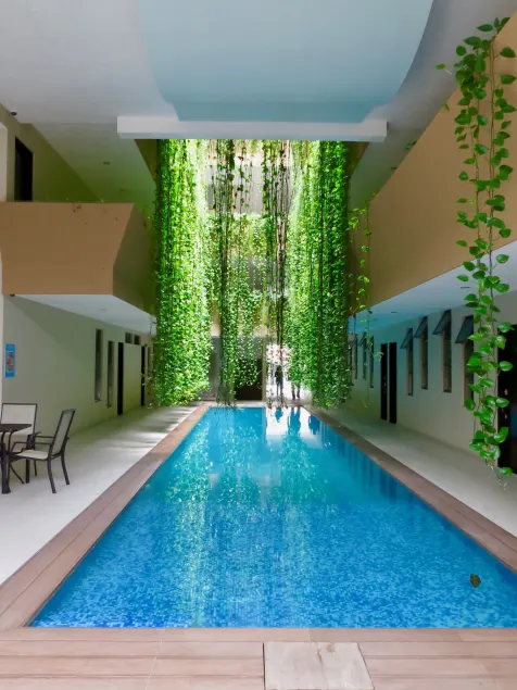Palmarena Rooms & Residences - Long Stay Comfort with Parking, Sauna, Gym & Pool - Steps from 5th Avenue - Image 1