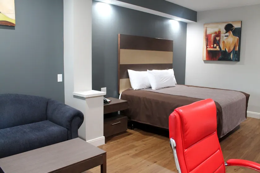 Grand Villa Inn and Suites Westchase/Chinatown - Image 1