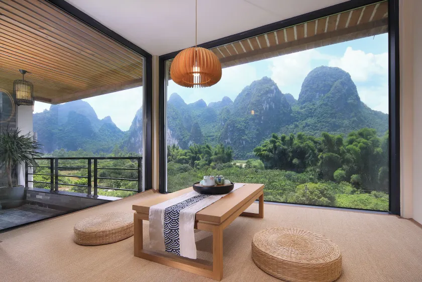 Yangshuo Lijiang Island Riverside Resort-English speaking & local guide & pick up service & sunset on the rooftop - Image 1