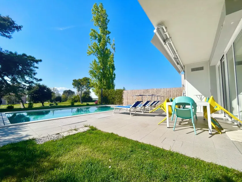 Golden hour retreat lagoon view villa with pool - Image 1