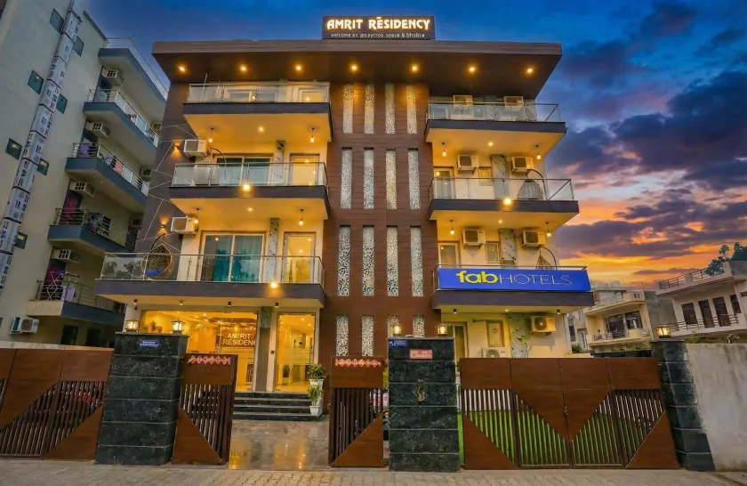 FabHotel Amrit Grand - Image 1