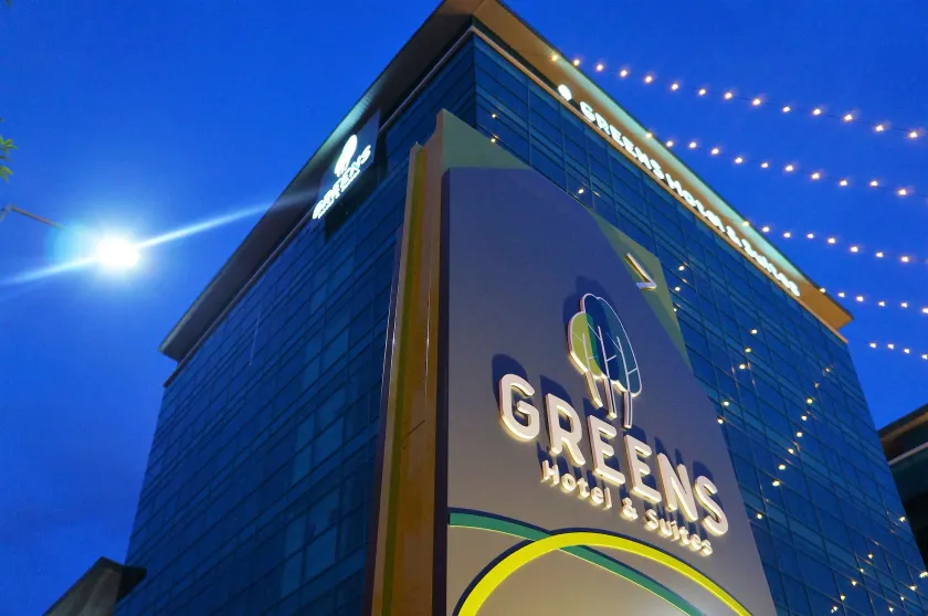 Greens Hotel & Suites - Image 1