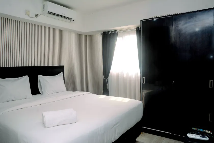 Homey and Big Studio Apartment at The Wave Kuningan By Travelio - Image 1