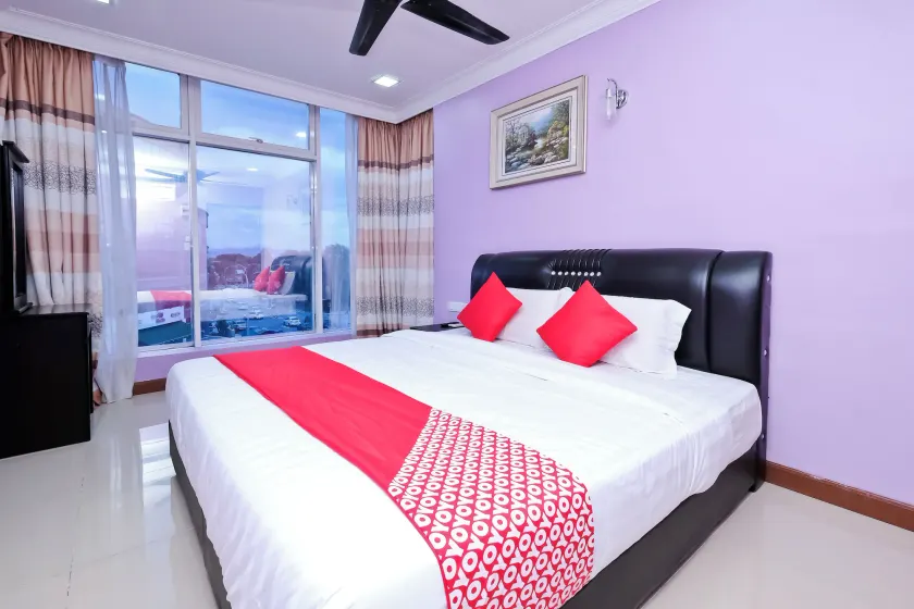 OYO 714 Arina Hotel - Image 1
