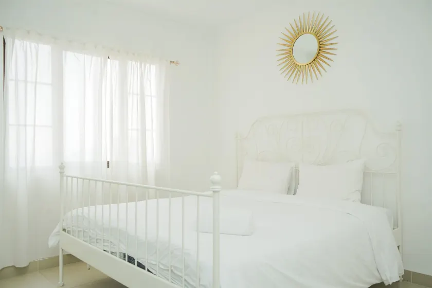 Strategic and Homey 2BR at Puri Garden Apartment near Mall By Travelio - Zimmer