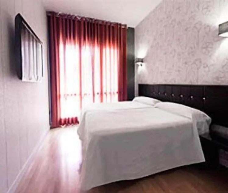Hospedium Hostal Un Punto Chic - Image 1