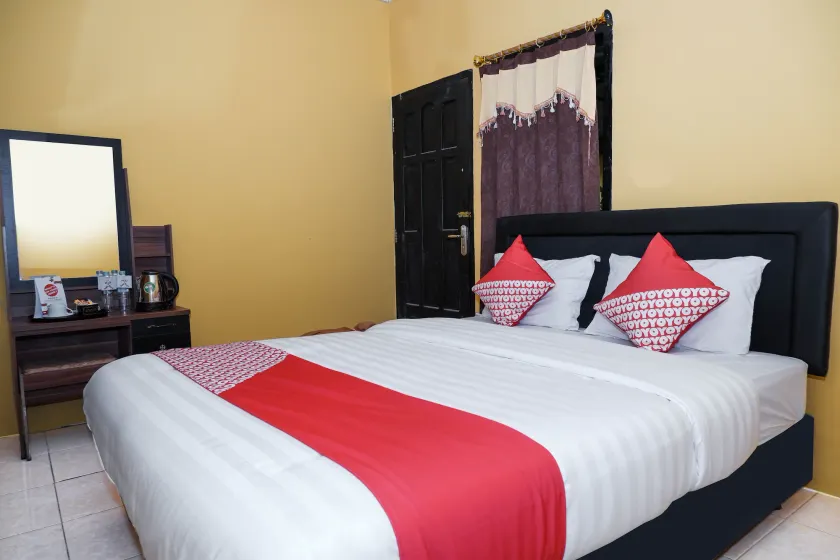 Super OYO 598 Udan Mas Guesthouse& Gallery - Image 1