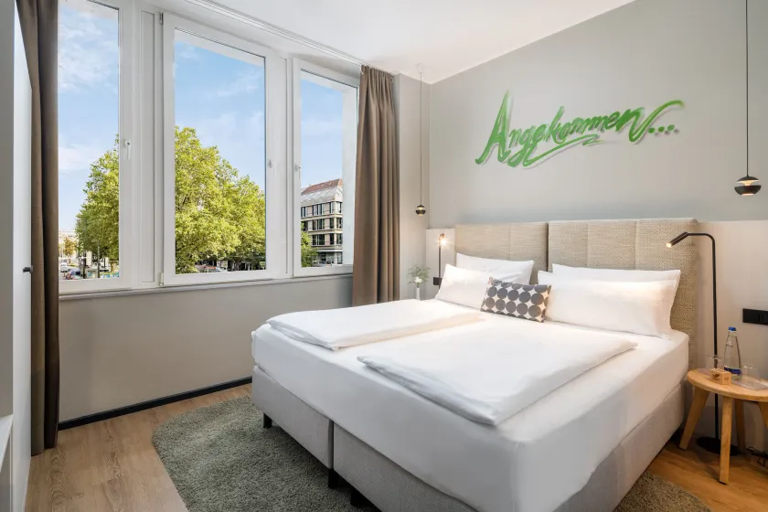 KOOS Hotel&Apartments - City Aparthotel - Image 1