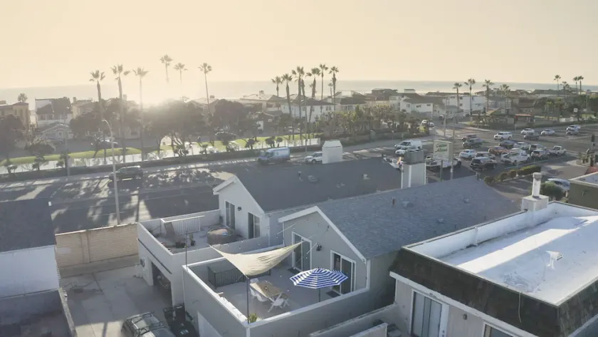 Stylish and Bright unit across the street from the beach at half the cost! - Image 1