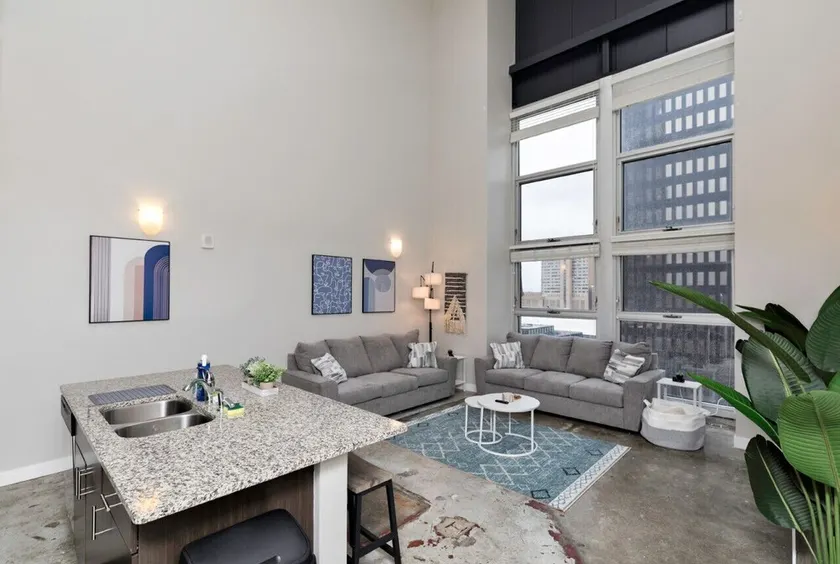 Modern Industrial Apartment with Skywalk - Image 1