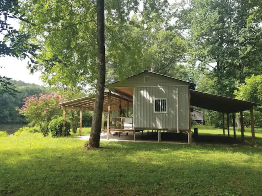 Secluded Riverfront Cabin Oasis - Image 1