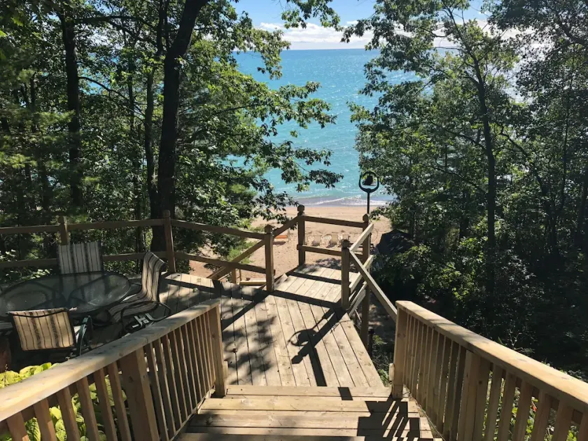 House is located on Lake Huron with a private beach - Image 1