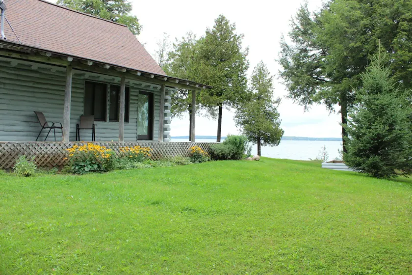 UP LIVING on Big Manistique Lake at its finest. 200 ft of private lake frontage. - Image 1
