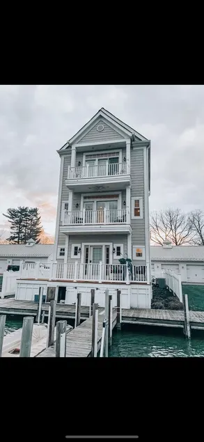 Beautiful 3 story home on the lake, master suite's on 1st & 3rd floors... - Image 1