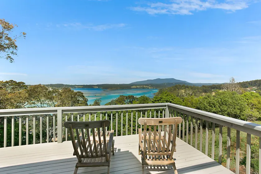 Architect-designed timber pole house with panoramic views - Image 1
