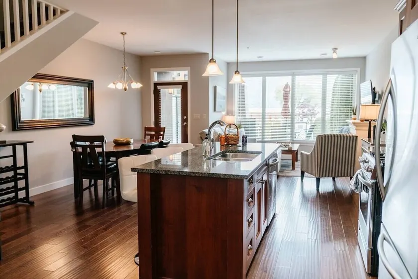 Poolside Barona Beach townhouse with lake views and private patio leading to the pool. Ideal for families/groups. Walk to the beach, enjoy the hot tub and resort amenities. Features a full kitchen, bunk room, king suite, and two living areas. - Image 1