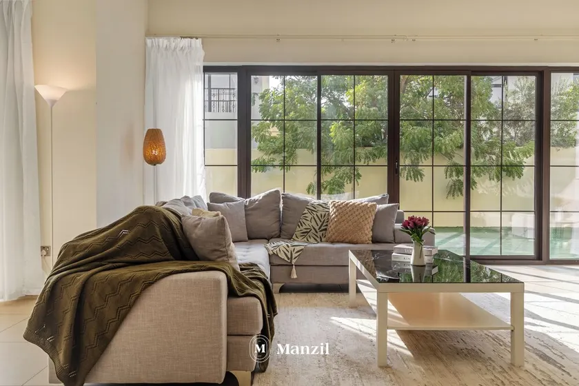 Manzil - 4BR Villa in Prime Location with Private Garden - Image 1