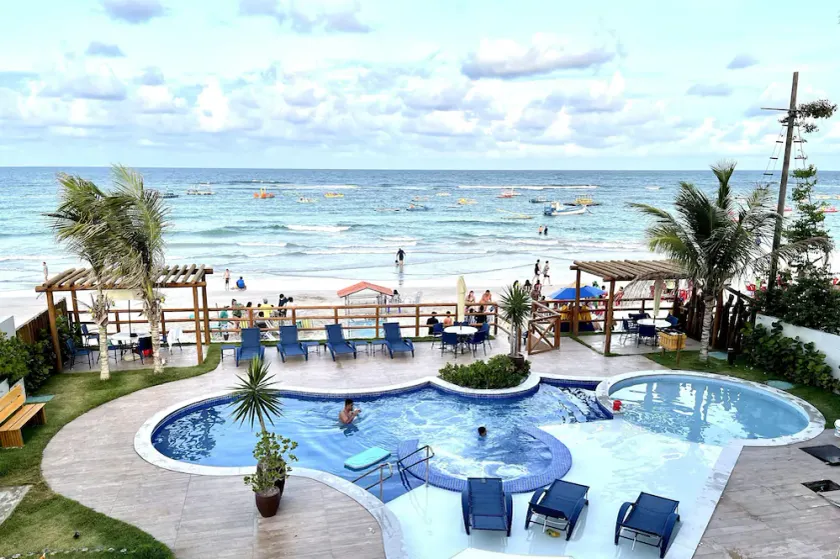 Exclusive apartment right in front of the natural pools - with a frontal view of the sea. - Image 1