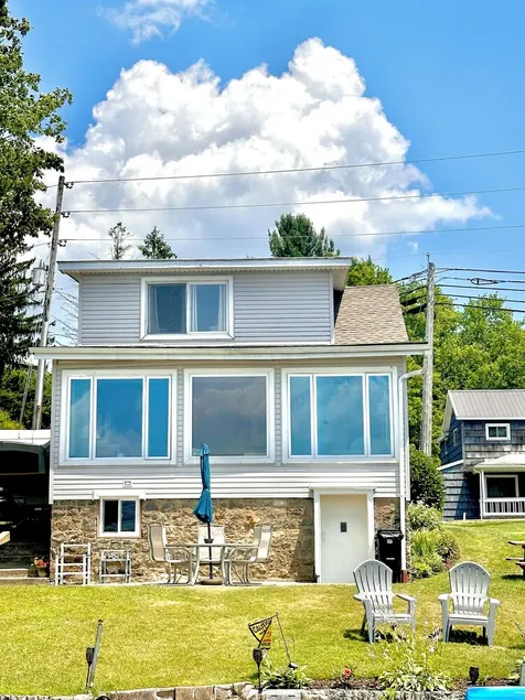 Spacious lakefront home with private dock and a panoramic view of Conneaut Lake. - Image 1