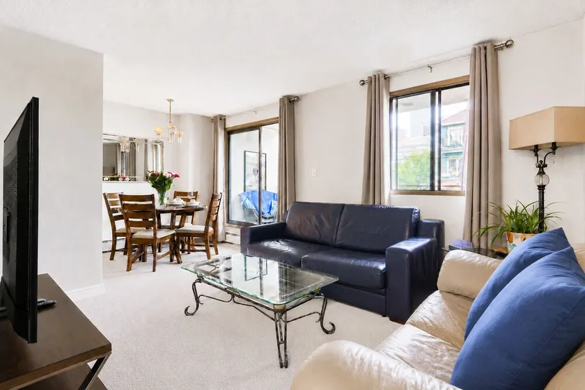 Entire Downtown Condo steps to BMO & Stampede with Parking, 1,5 hrs to Banff - Image 1