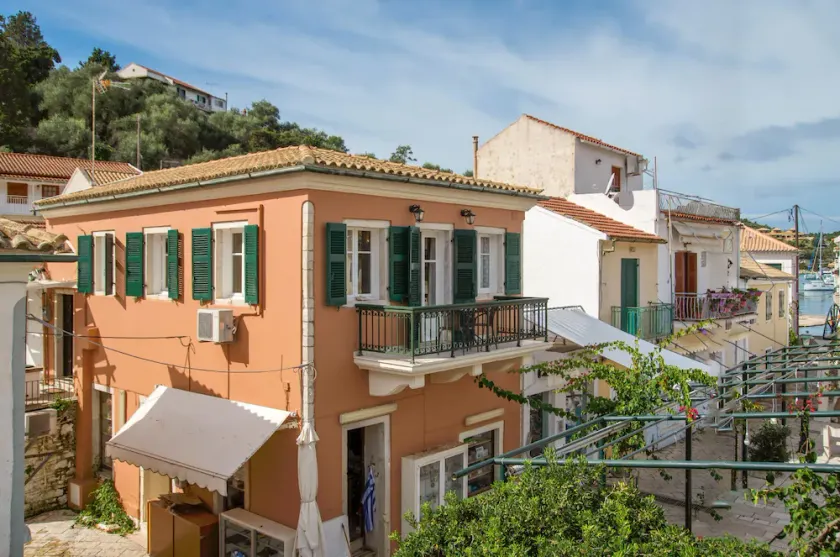 Charming Lakka Retreat: Angelina Apartment with A/C and Central Square Balcony - Image 1