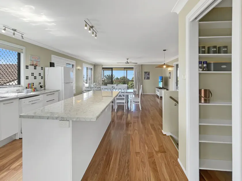 Coastal Upper-Level Home with Pool Access - Image 1
