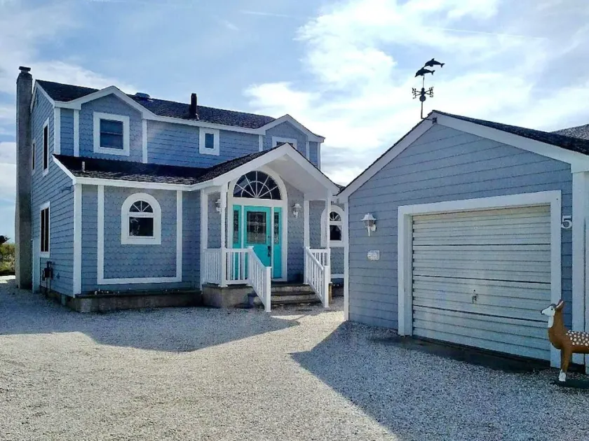 BEACH FRONT Classic 4 bedroom 3 bath Cape Cod style home located right at the bulkhead of the beach, yet only 3 short blocks to the center of town. - Image 1