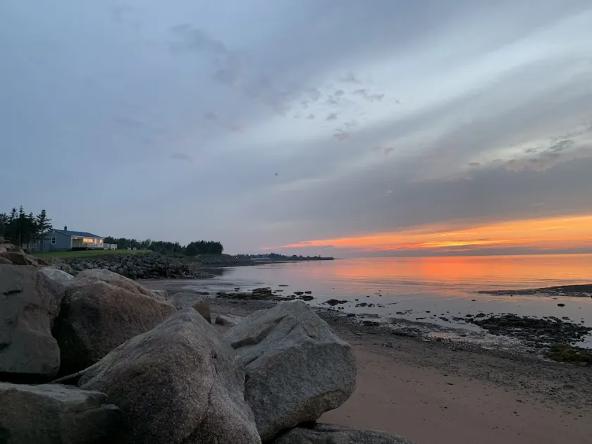 Oceanfront beach cottage panoramic views spectacular sunsets sandbars warm water - Image 1