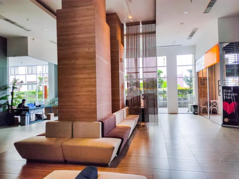 Furnished Studio at Tamansari Mahogany By Travelio - Image 1