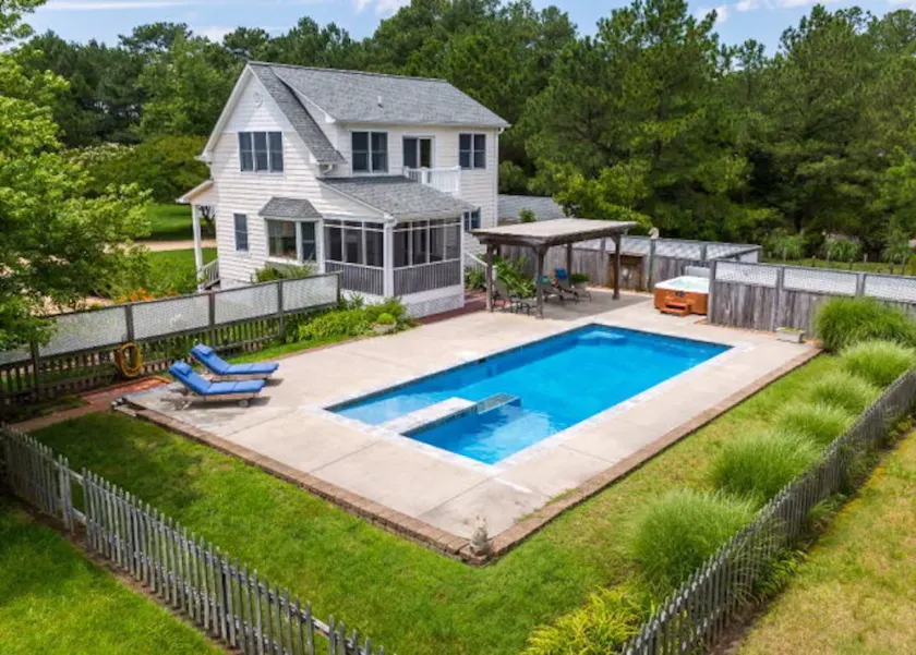 Private, secluded waterfront cottage - pool and hot tub feet from the back door. - Image 1