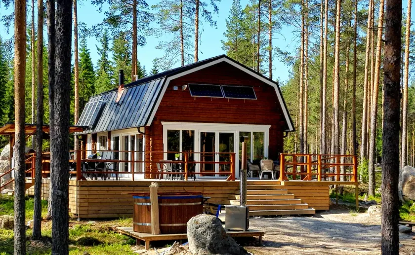 Comfortable newly built log cabin in the middle of the forest, built for quality of life and community. - Image 1