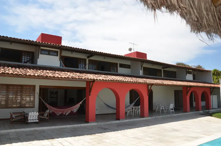 Excellent beachfront house with pool, swim-up bar, and mini soccer field. - Image 1