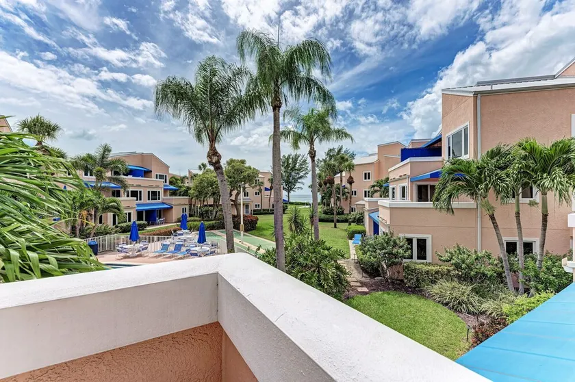 Unit #210 Sand Cay Beach Resort Pool View - Image 1