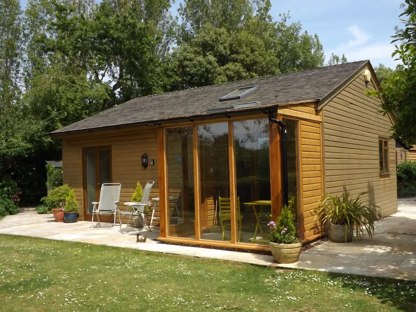 A beautiful pine chalet with its own private garden surrounded by fields - Image 1