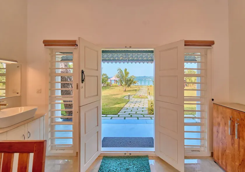 The White Lotus Ashtamudi by VOYE HOMES - Pet Friendly & Events Welcome - Image 1