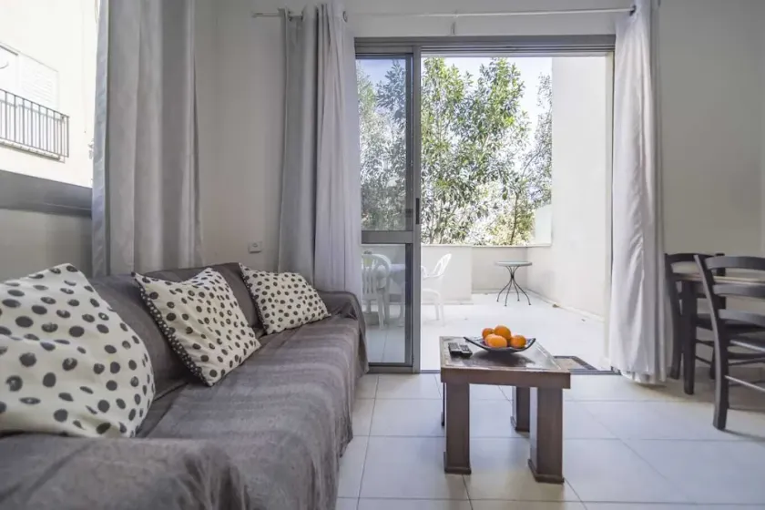 Sunny 2-Room Apartment with Spacious Terrace, Steps from Bograshov Beach - Image 1