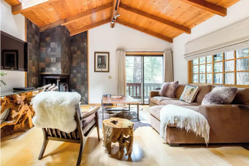 Cabin Nestled in Forested Canyon - Image 1
