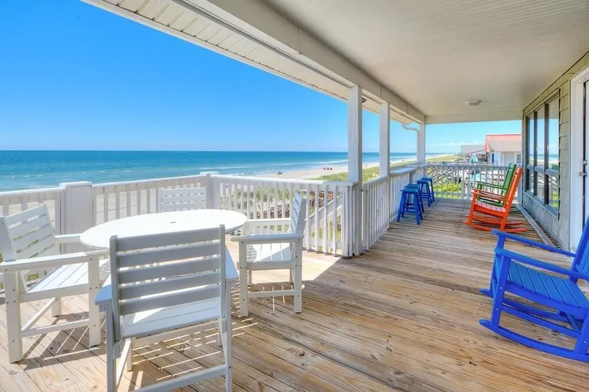Experience oceanfront luxury at Happy Feet in Oak Island, with 4 bedrooms for 16 guests. - Image 1
