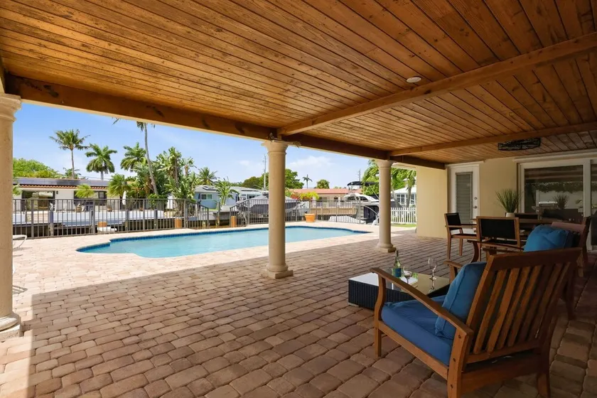Waterfront Home at Bella Acqua – Heated Pool, Dock & Beach 5-Minutes Away - Image 1