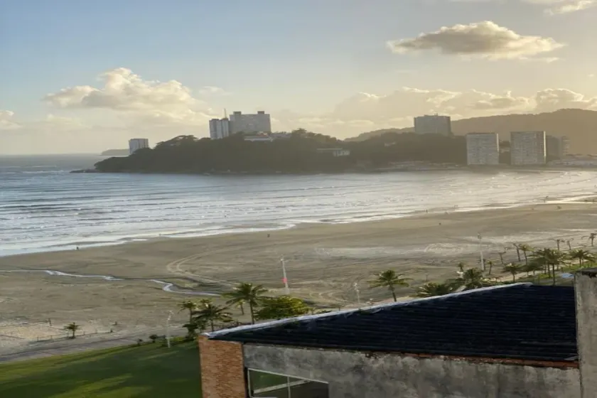 The building is right across from the beach, and the studio apartment has a wide view of it. - Image 1