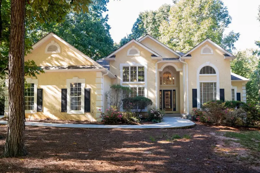 Spivey Manor · Sink into the Luxe Corner Tub at an Upscale, Spacious Home - Image 1