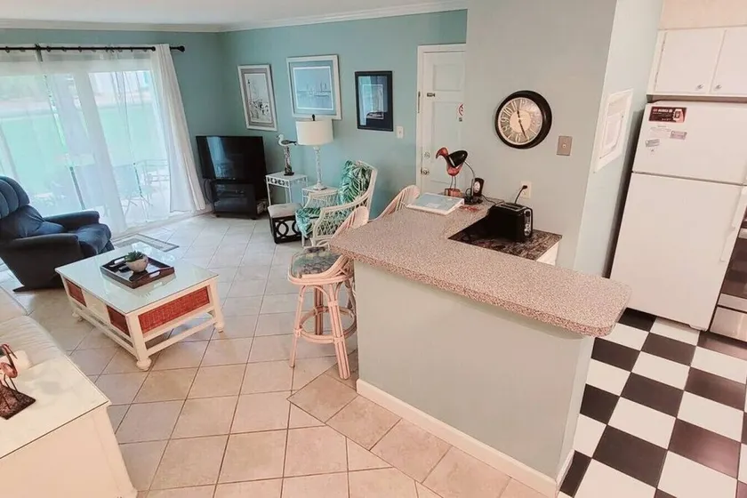 A3 tile floors pet friendly easy access downstairs faces nice grassy area Close to pool - Image 1