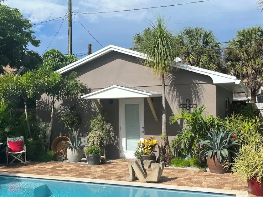 Chill on the patio overlooking the pool & lush gardens with privacy! - Image 1