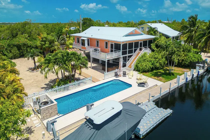 Tropical Oasis with Beautiful Home, Pool, Dock and Tiki Hut - Image 1