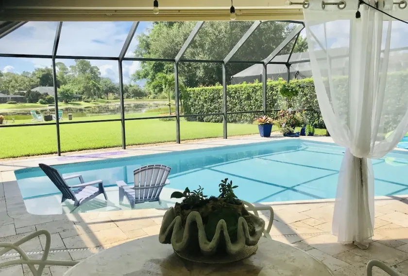 Swimming pool, lake view, minutes to Naple's downtown and beach. - Image 1