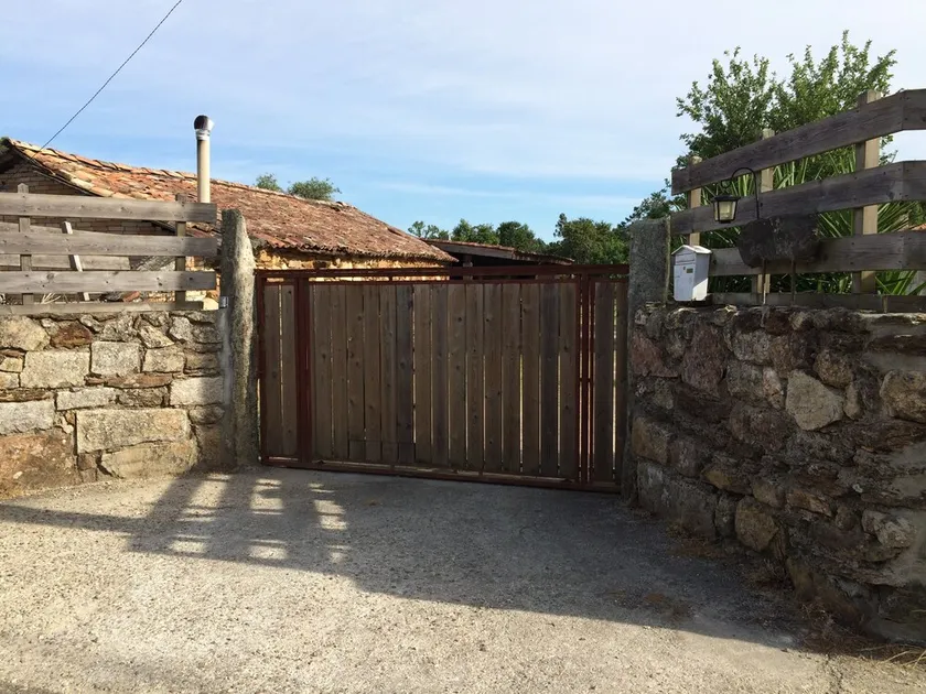 Rural house with large enclosed farm and outdoor grill - Image 1